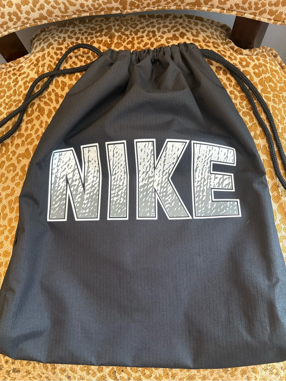 Nike Black Drawstring Backpack with White Logo